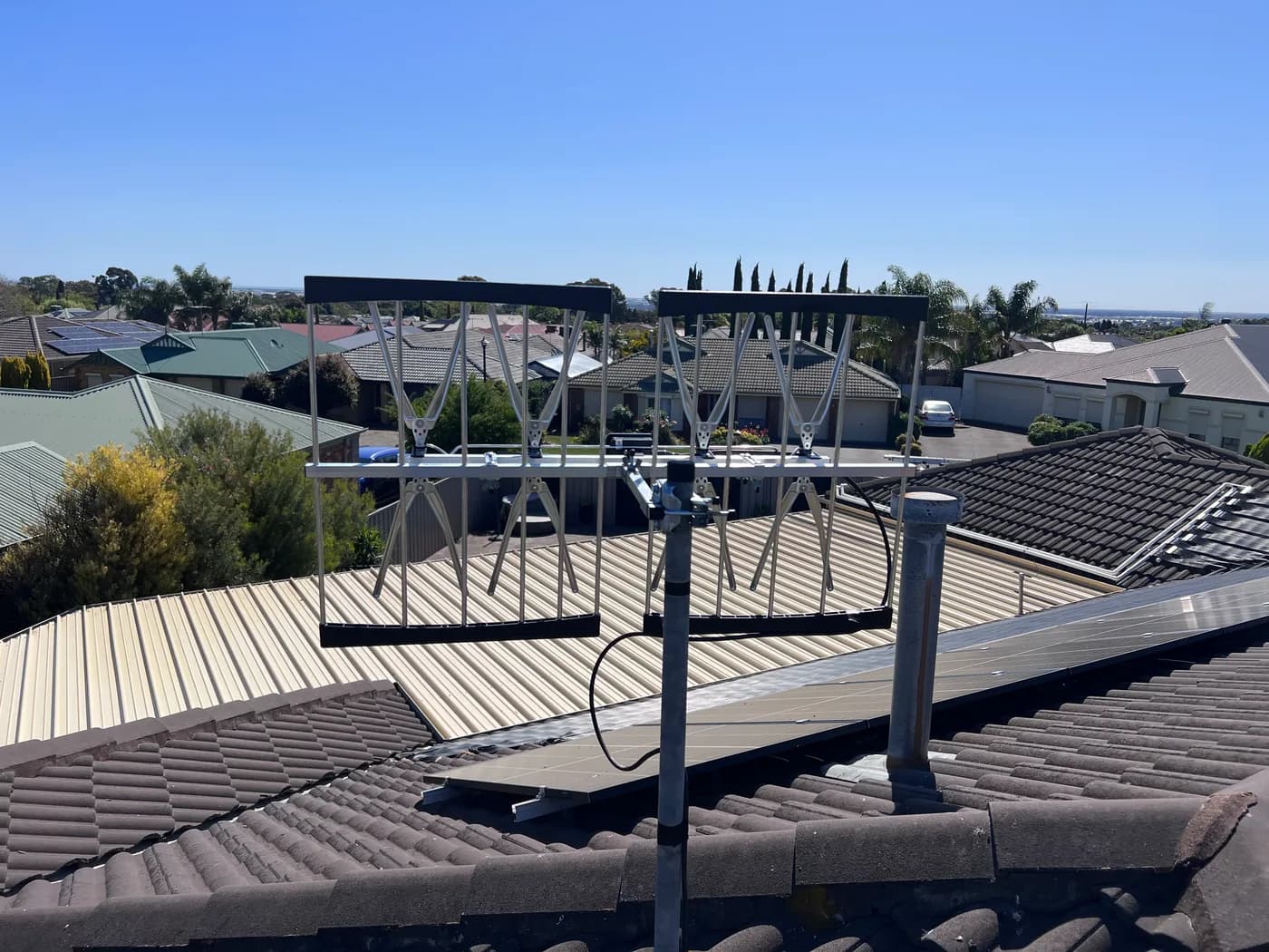 High-gain phased-array antenna installed on a Craigmore rooftop with a view to the hills