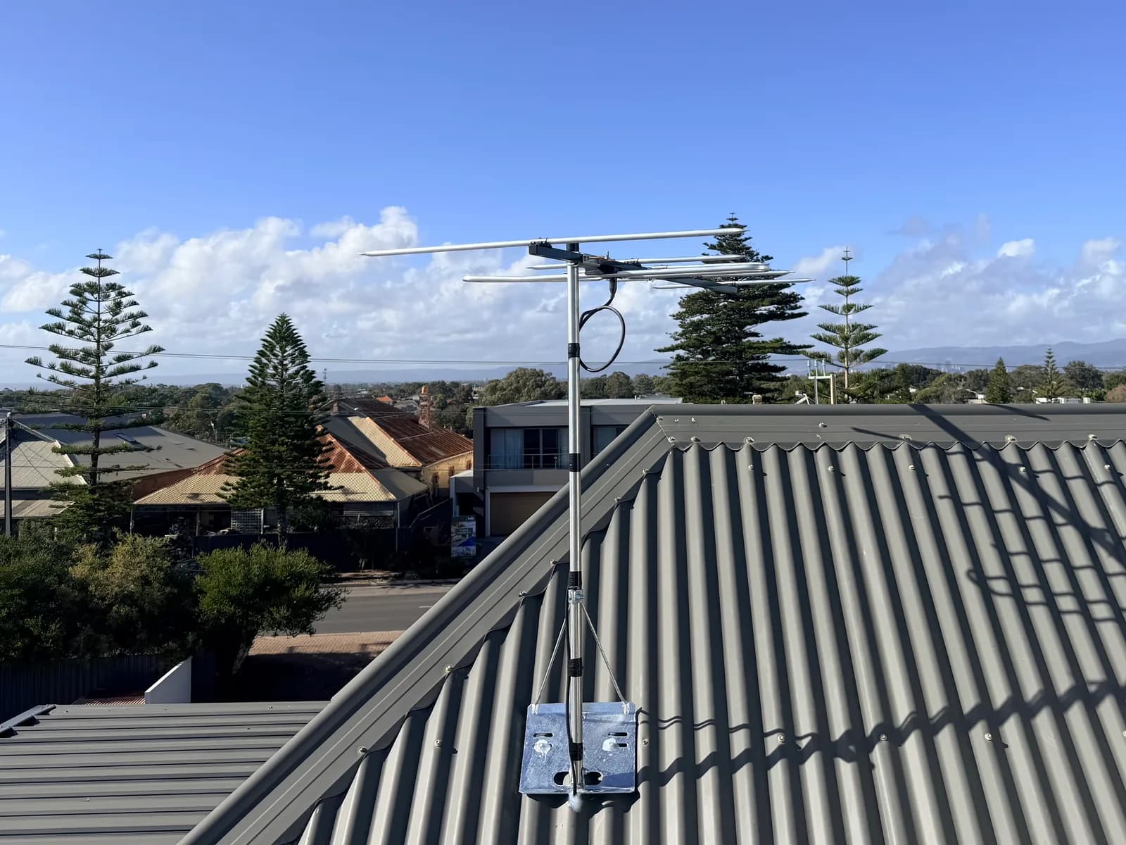 New TV antenna installed on a Glenelg rooftop with a coastal outlook, Adelaide