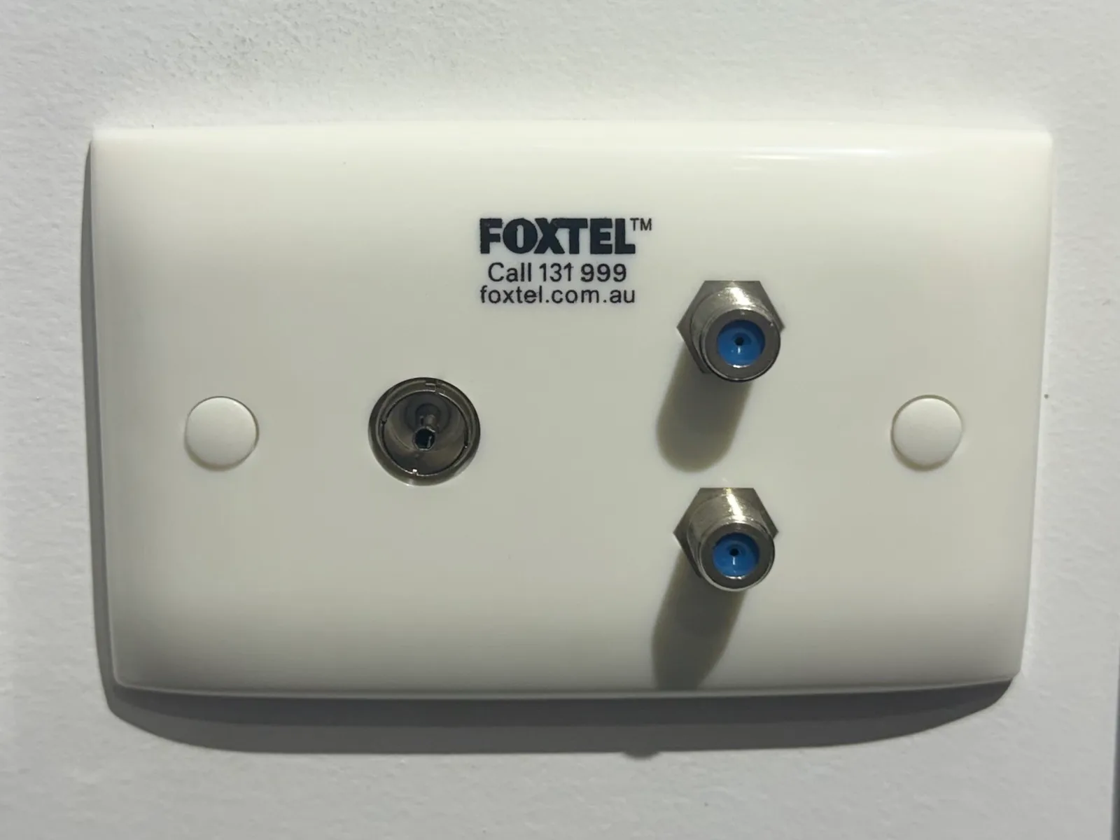 A newly installed Foxtel and TV outlet wall plate in an Adelaide home